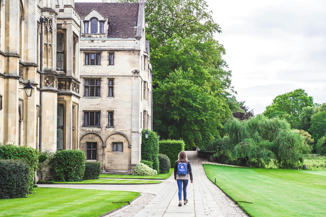 Person walking around Kings College grounds